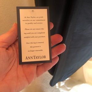 Black spaghetti strap formal dress with delicate beading on the sides. Gorgeous!